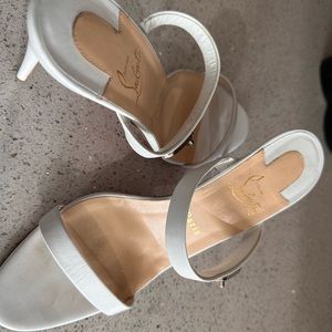 Christian Louboutin white sandals.  Worn twice.